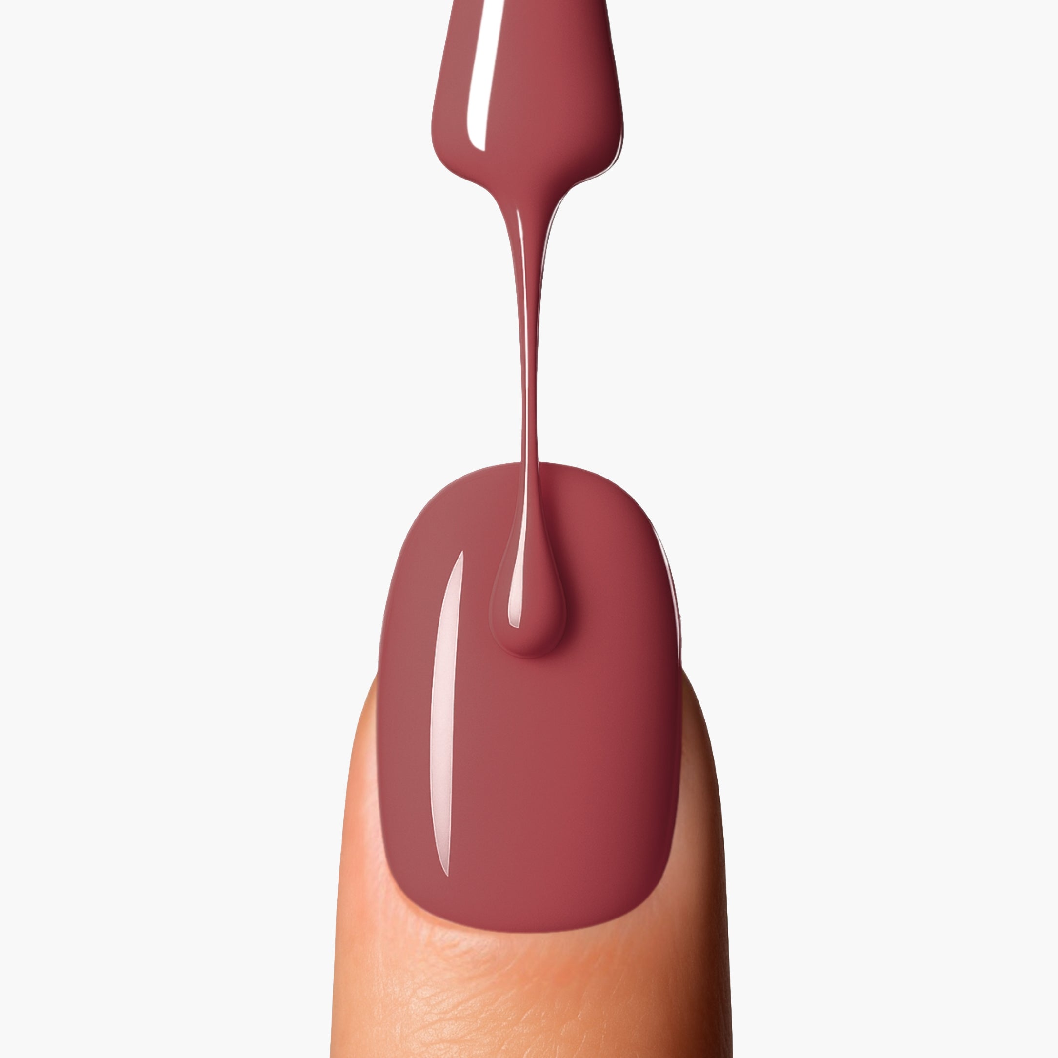 Application close up of LAVERTU Nail Polish Nature 33 Sutter’s Brown showing a smooth warm brown shade with subtle rose undertones and a high-gloss finish on the nail.