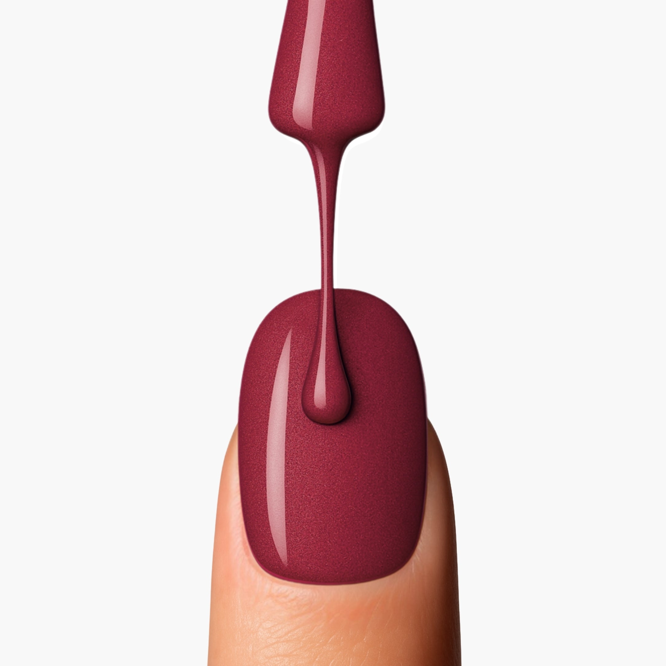 LAVERTU Nail Polish Unique 18 Red Sympathie application detail showing a warm vibrant red nail colour with smooth application, full coverage and a glossy finish.