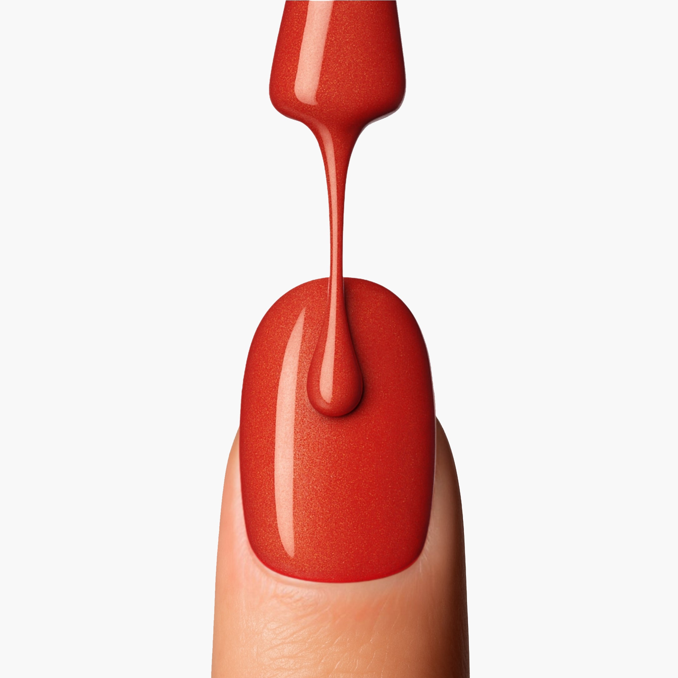 LAVERTU Nail Polish Unique 20 Lia Orange application detail showing a warm copper orange nail colour with smooth application and glossy finish.