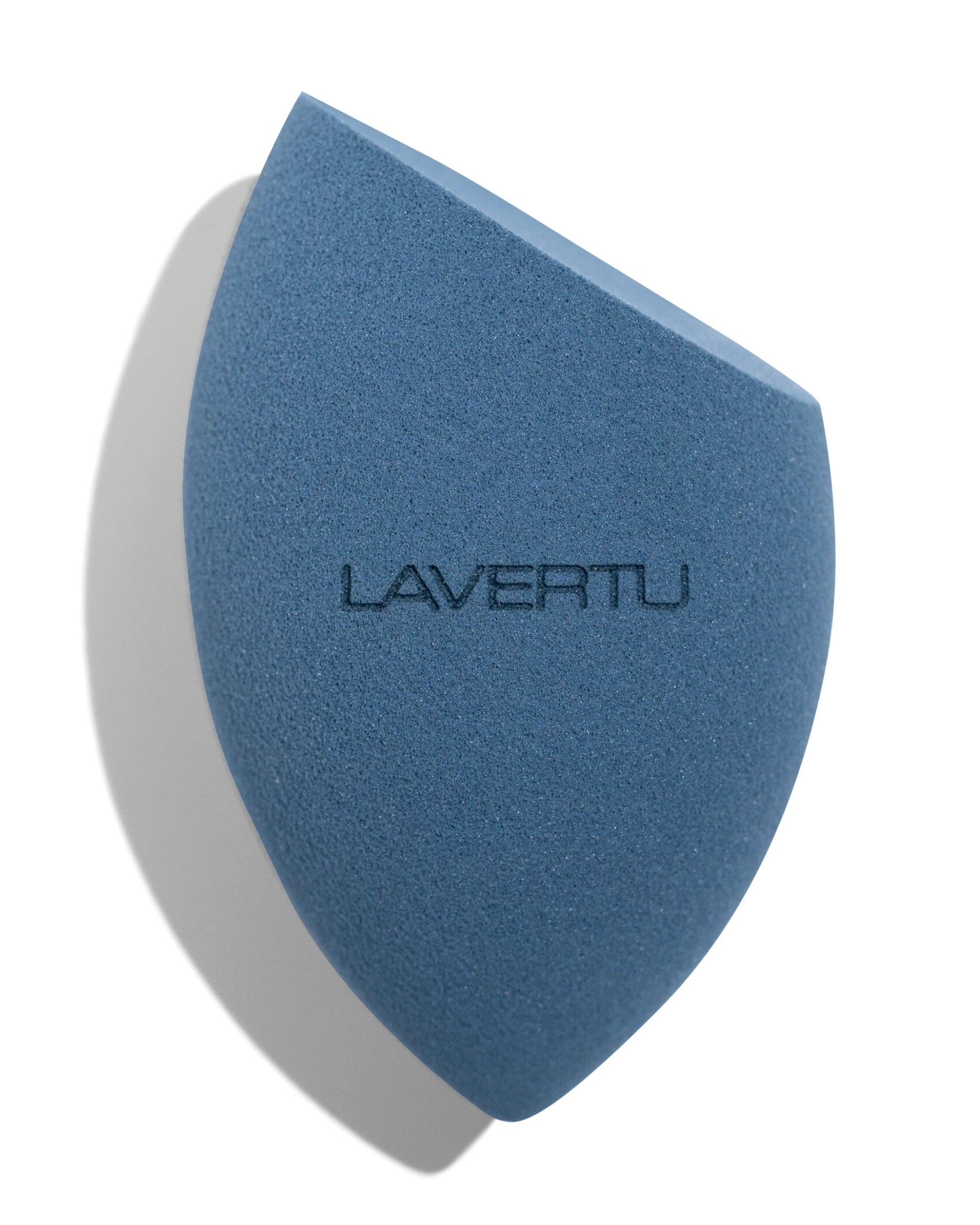 Lavertu makeup sponge in Signature Blue for flawless foundation and concealer application on white background.