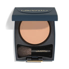Lavertu powder compact with brush on a white background