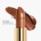 Detailed texture view of LAVERTU Lipstick Unique 14 Copper highlighting a warm copper brown shade with with rich bronze undertones, full coverage pigment and creamy matte texture.
