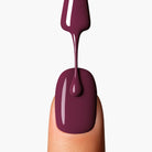 Close-up of nail application with LAVERTU Nail Polish Nature 34 Metanoia Rose showing a deep muted rose shade with brown undertones and smooth glossy finish.
