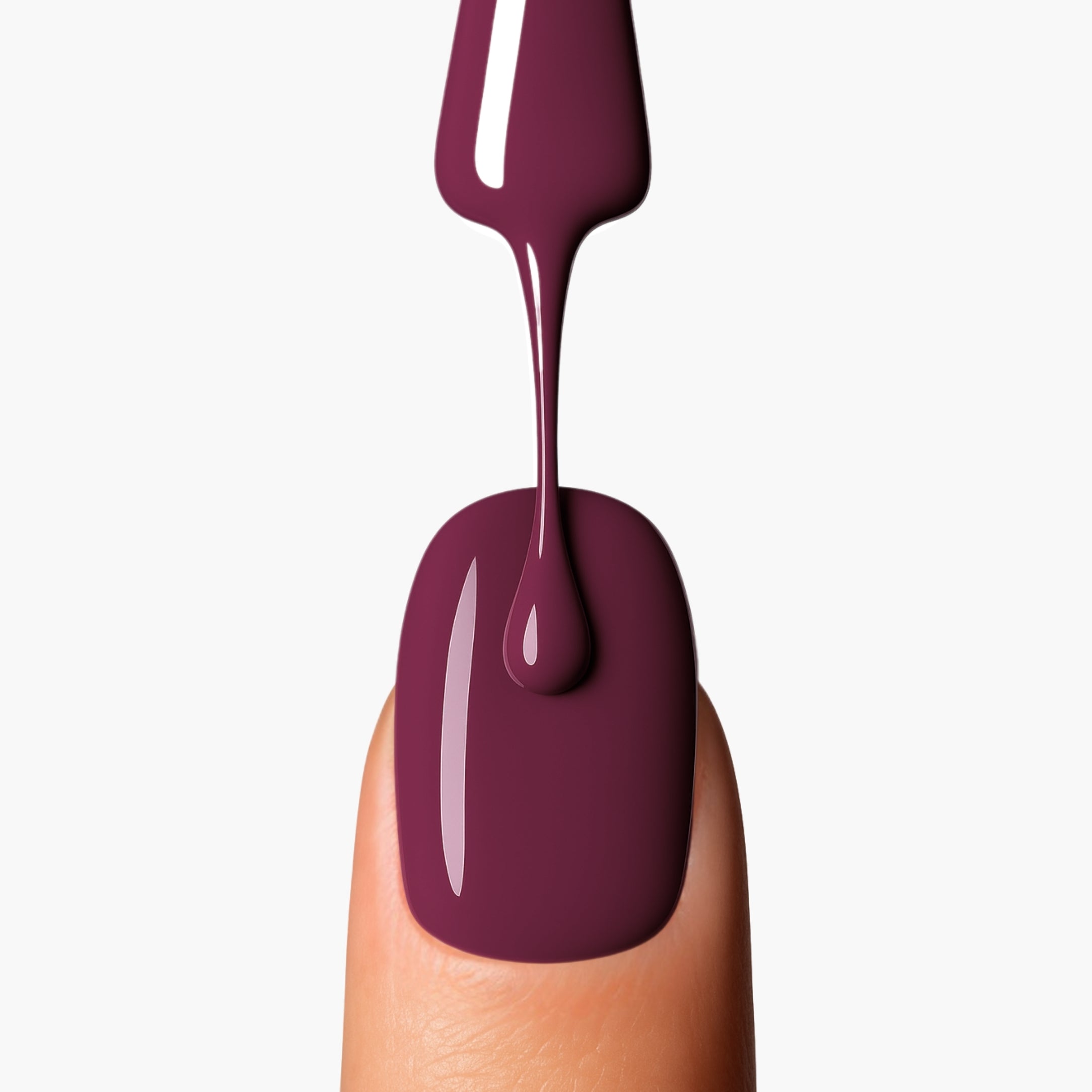 Close-up of nail application with LAVERTU Nail Polish Nature 34 Metanoia Rose showing a deep muted rose shade with brown undertones and smooth glossy finish.