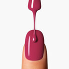 Application close-up of LAVERTU Nail Polish Nature 36 Diablotin Red showing a deep classic red with warm undertones, smooth even coverage and high-gloss finish on the nail.