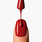 Close up application of LAVERTU Nail Polish Unique 19 Altissimo Red showing a deep true red colour with smooth, even coverage and high shine finish.