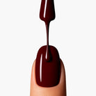 LAVERTU Nail Polish Unique 26 Gravety Beauty application detail showing a rich deep burgundy nail colour with smooth application and glossy finish.
